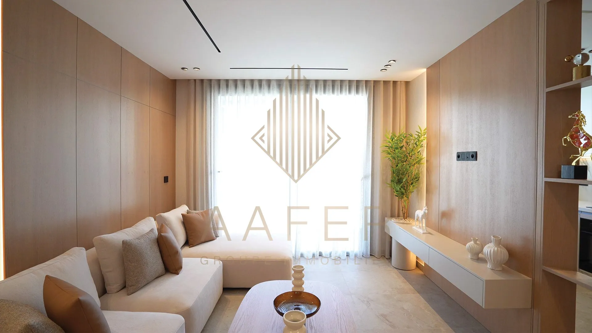 Woonkamer van het modelappartement in Résidence Alpinia