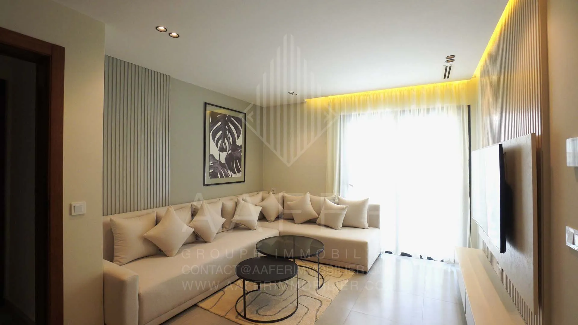 Woonkamer van een opgeleverd appartement in Résidence Oscar