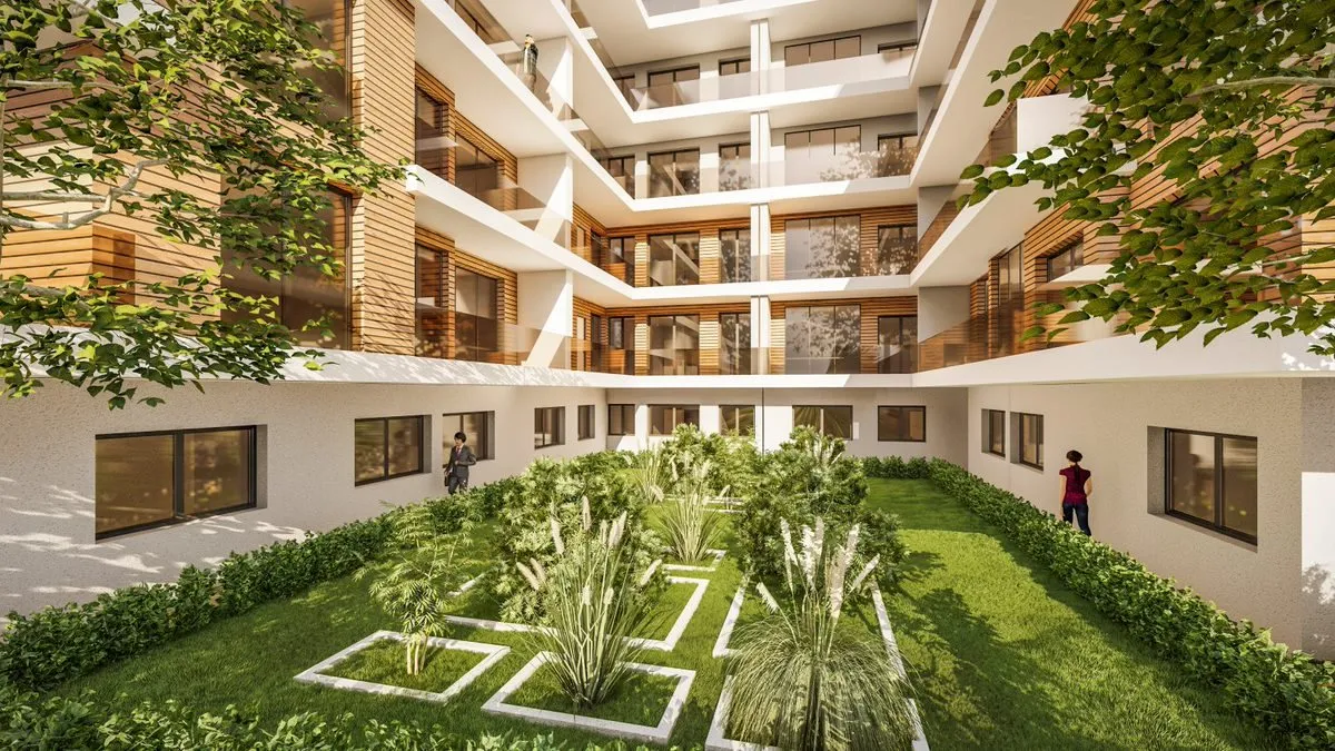 Aangelegde binnentuin tussen de gebouwen van Perla